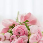 A beautiful close-up of a pink ranunculus bouquet, perfect for backgrounds or floral designs.